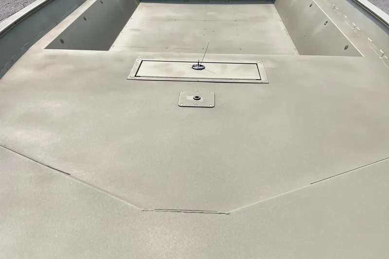 Slide: The Image of 2025 Tracker GRIZZLY 2072 Utility boat interior, featuring a spacious, flat deck design. - 7