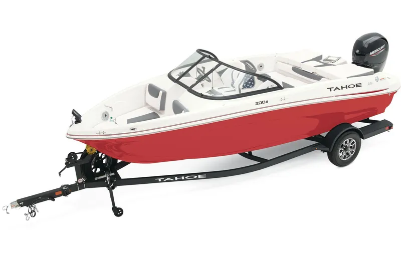 Slide: The Image of 2025 Tahoe 200 S boat with Mercury engine on trailer, parked outdoors. - 2