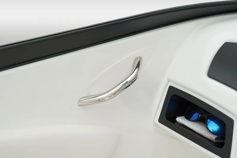 Slide: The Image of 2025 Tahoe 200 S boat interior with dual seating and modern dashboard controls. - 46