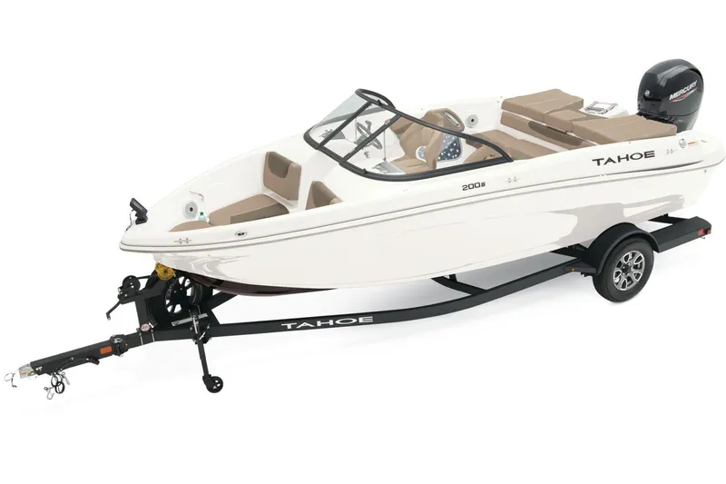 Slide: The Image of 2025 Tahoe 200 S boat interior with white seating and steering wheel, showcasing modern design. - 5