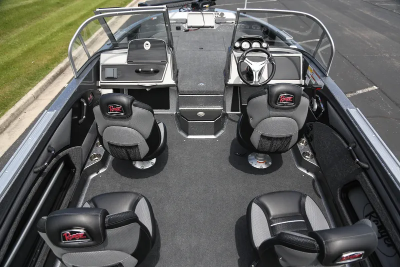 Slide: The Image of Interior of 2025 Ranger 2080MS boat with modern seating and dashboard design. - 5