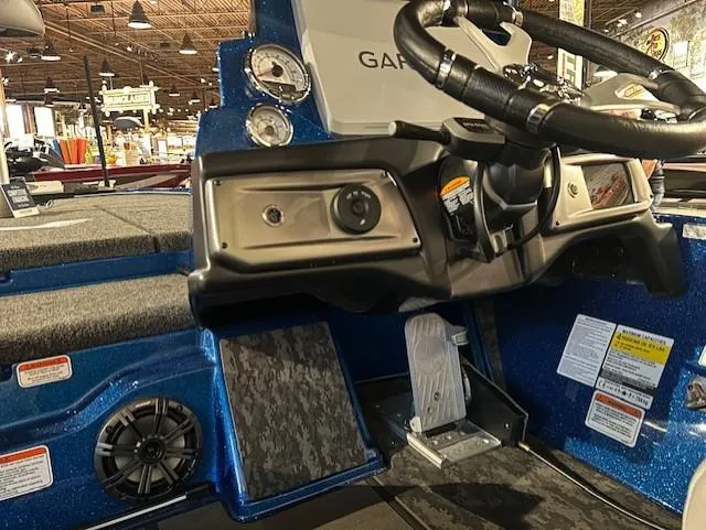 Slide: The Image of Interior view of 2025 Nitro Z20 XL Pro boat dashboard with steering wheel and controls. - 10