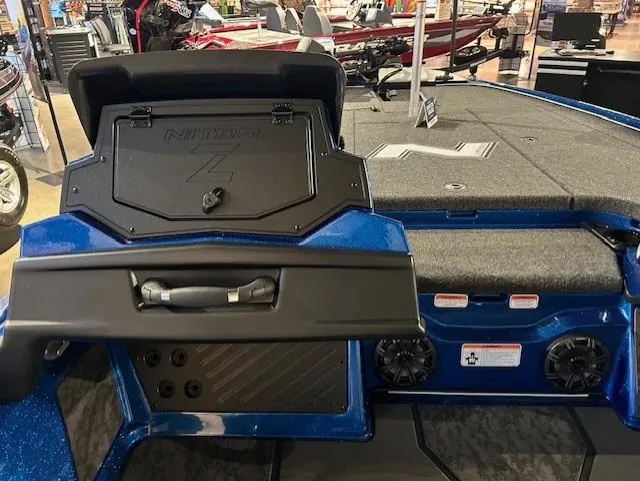 Slide: The Image of 2025 Nitro Z20 XL Pro boat interior with blue accents and storage compartments. - 11