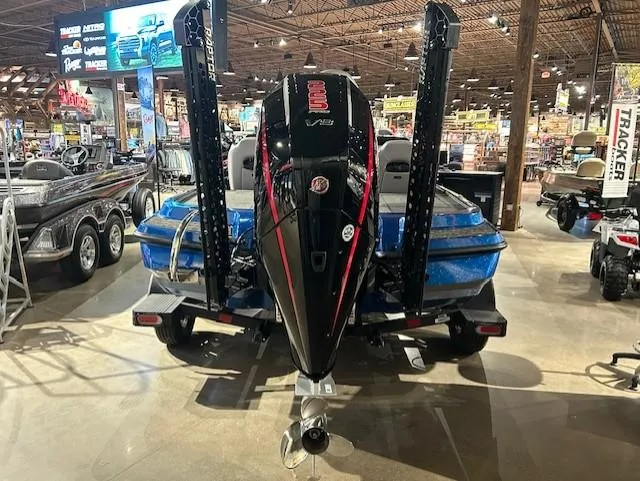 Slide: The Image of 2025 Nitro Z20 XL Pro boat displayed indoors, showcasing powerful engine and sleek design. - 14