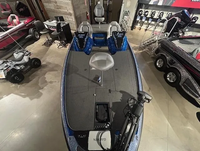 Slide: The Image of 2025 Nitro Z20 XL Pro bass boat in showroom, featuring sleek design and advanced equipment. - 8