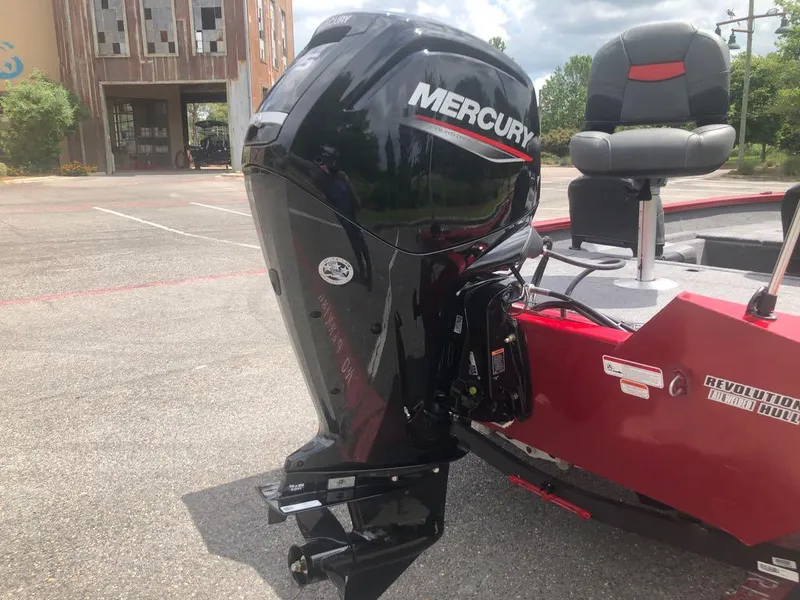 Slide: The Image of 2025 Tracker Pro Team 175 Crappie Edition with Mercury outboard motor, parked outdoors. - 10