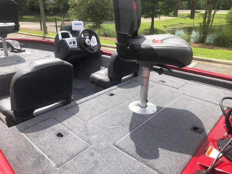 Slide: The Image of 2025 Tracker Pro Team 175 Crappie Edition boat interior with seating and steering console. - 8