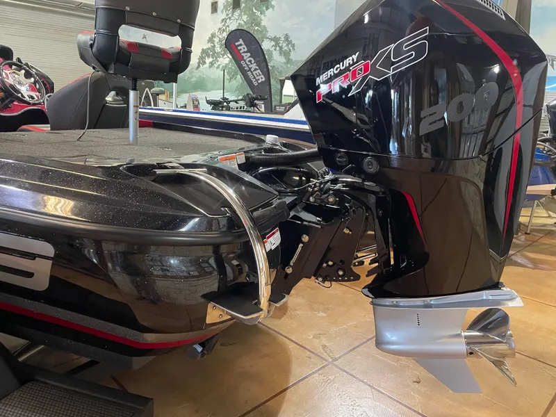 Slide: The Image of 2025 Nitro Z19 Pro boat with Mercury Pro XS engine in showroom. - 2