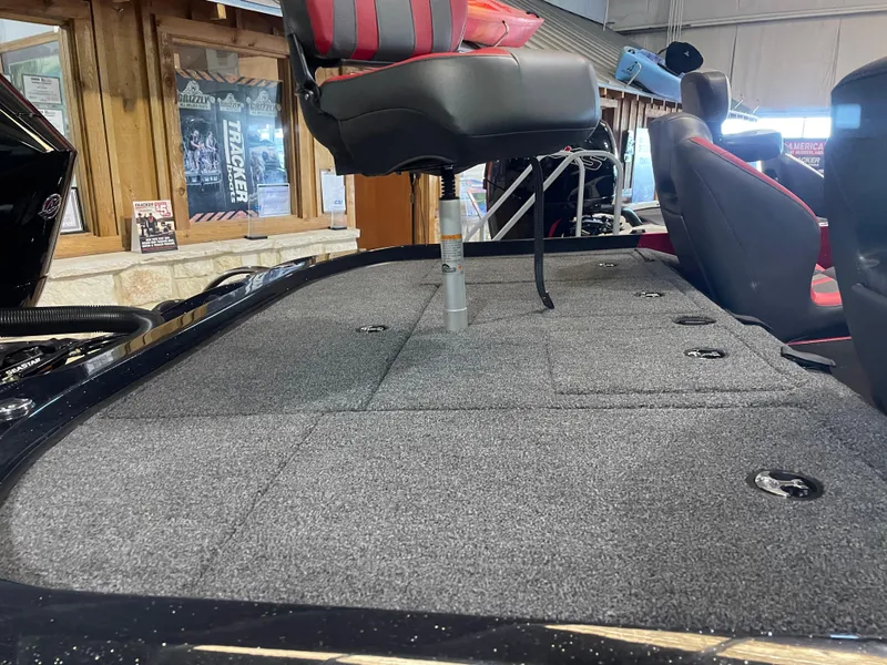 Slide: The Image of 2025 Nitro Z19 Pro boat interior with gray carpet and seating. - 6