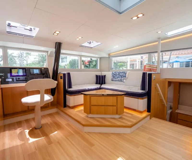 Slide: The Image of Luxurious interior of 2026 McConaghy MC62 yacht with modern seating and navigation area. - 11