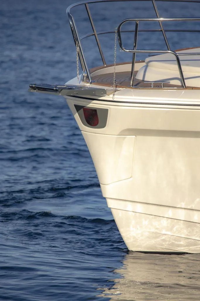 Slide: The Image of 2025 Marex 440 Gourmet Cruiser bow on calm water. - 19