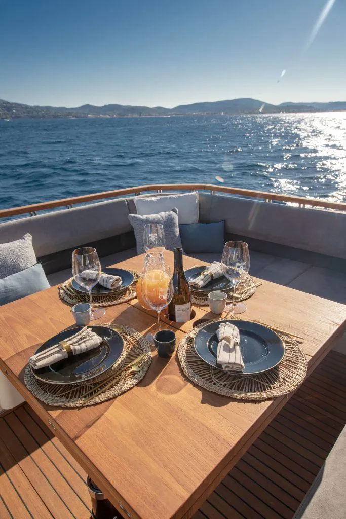 Slide: The Image of Luxury dining setup on Marex 440 Gourmet Cruiser, 2025, with ocean view. - 27