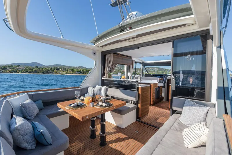 Slide: The Image of Luxurious Marex 440 Gourmet Cruiser 2025 yacht with elegant outdoor dining area. - 28