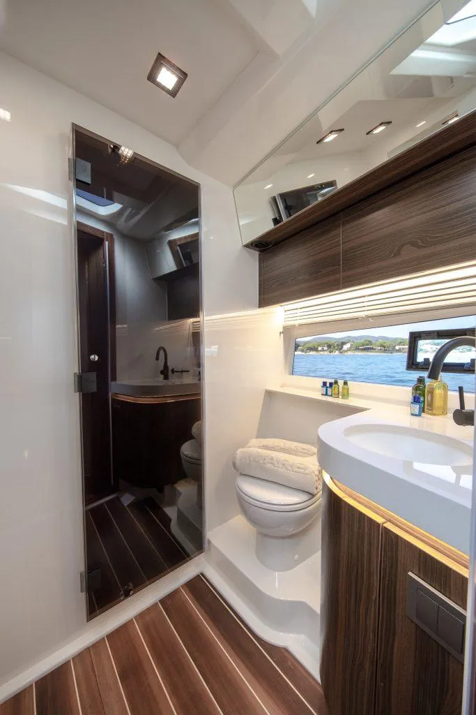 Slide: The Image of Luxurious bathroom in 2025 Marex 440 Gourmet Cruiser with modern fixtures and ocean view. - 38
