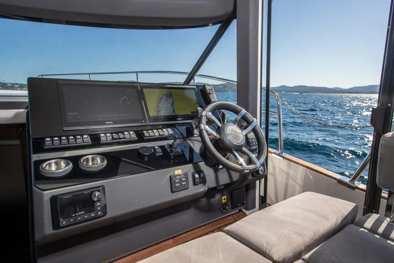 Slide: The Image of Helm of 2025 Marex 440 Gourmet Cruiser with ocean view. - 41