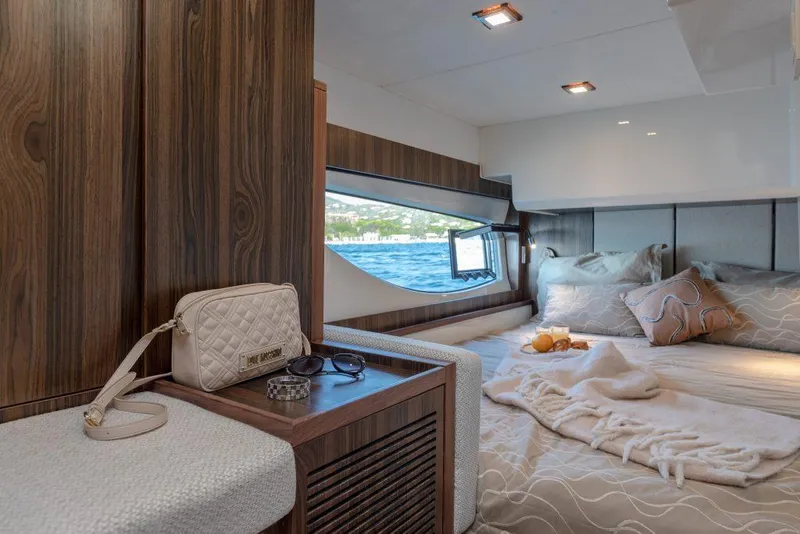 Slide: The Image of Luxurious cabin interior of 2025 Marex 440 Gourmet Cruiser with elegant decor and sea view. - 44