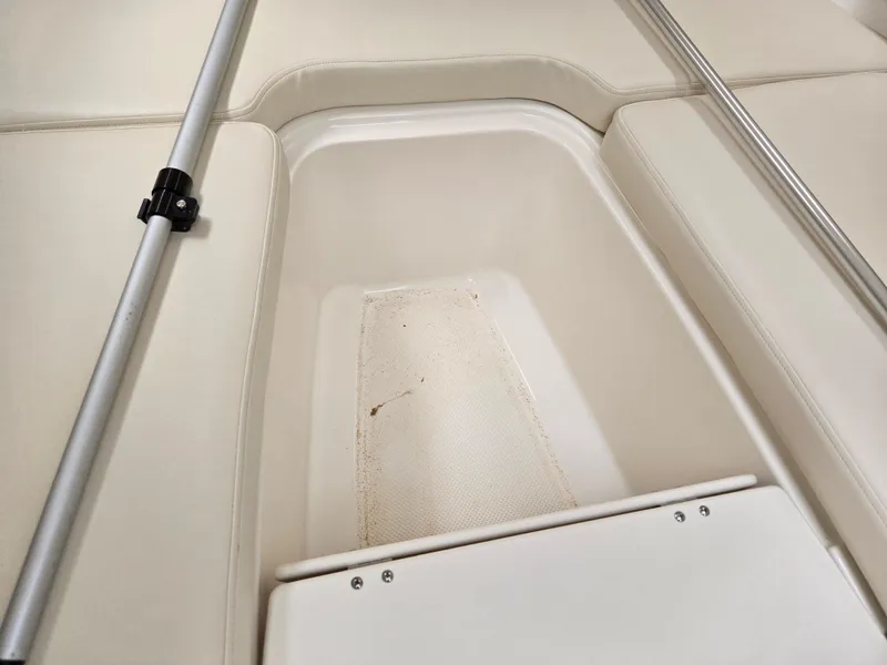 Slide: The Image of 2015 Bayliner 642 Overnighter boat interior storage compartment. - 29