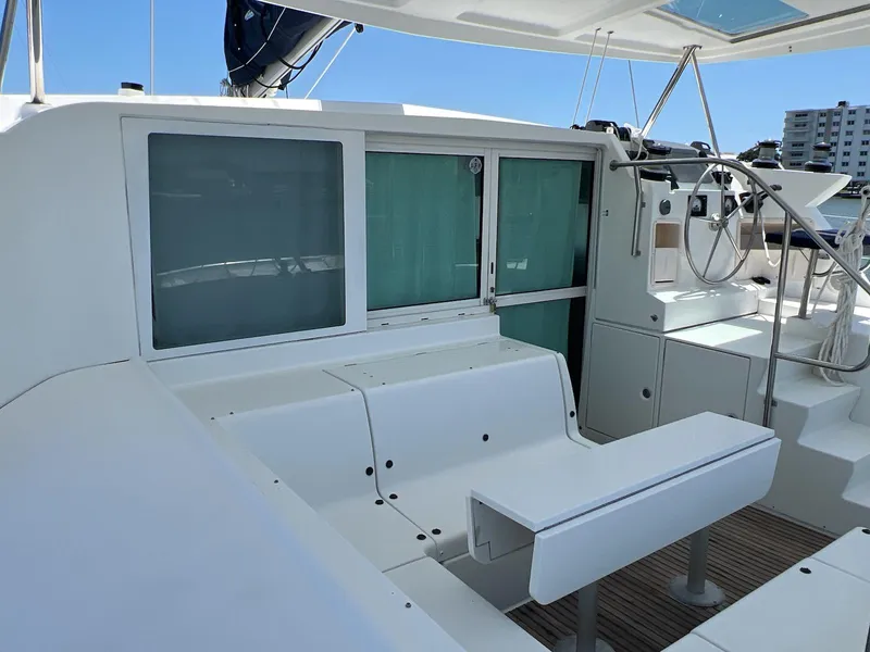 Slide: The Image of 2008 Lagoon 420 yacht cockpit with seating, helm, and modern design features. - 18