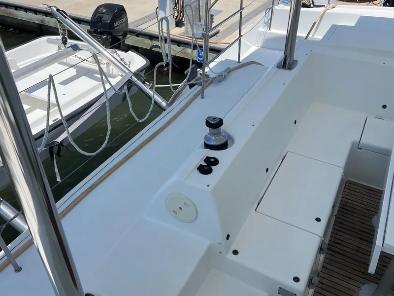 Slide: The Image of 2008 Lagoon 420 yacht deck with winch and seating area. - 22