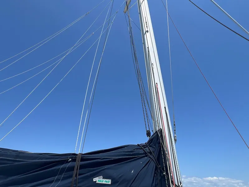 Slide: The Image of Sailboat mast and rigging of 2008 Lagoon 420 against clear blue sky. - 34
