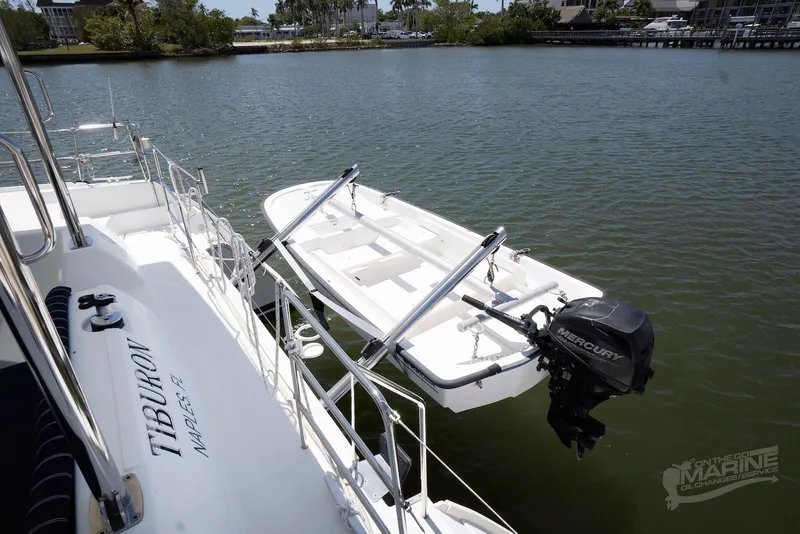 Slide: The Image of Lagoon 420 yacht with attached dinghy on calm water, 2008 model. - 48