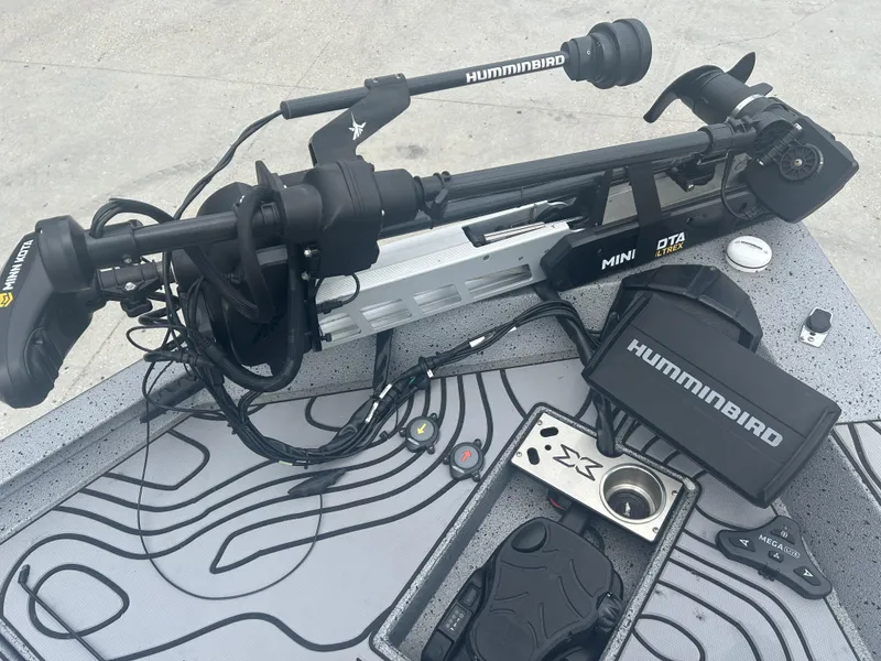 Slide: The Image of Fishing boat equipment featuring Humminbird electronics on a 2021 Xpress X19 Pro. - 14