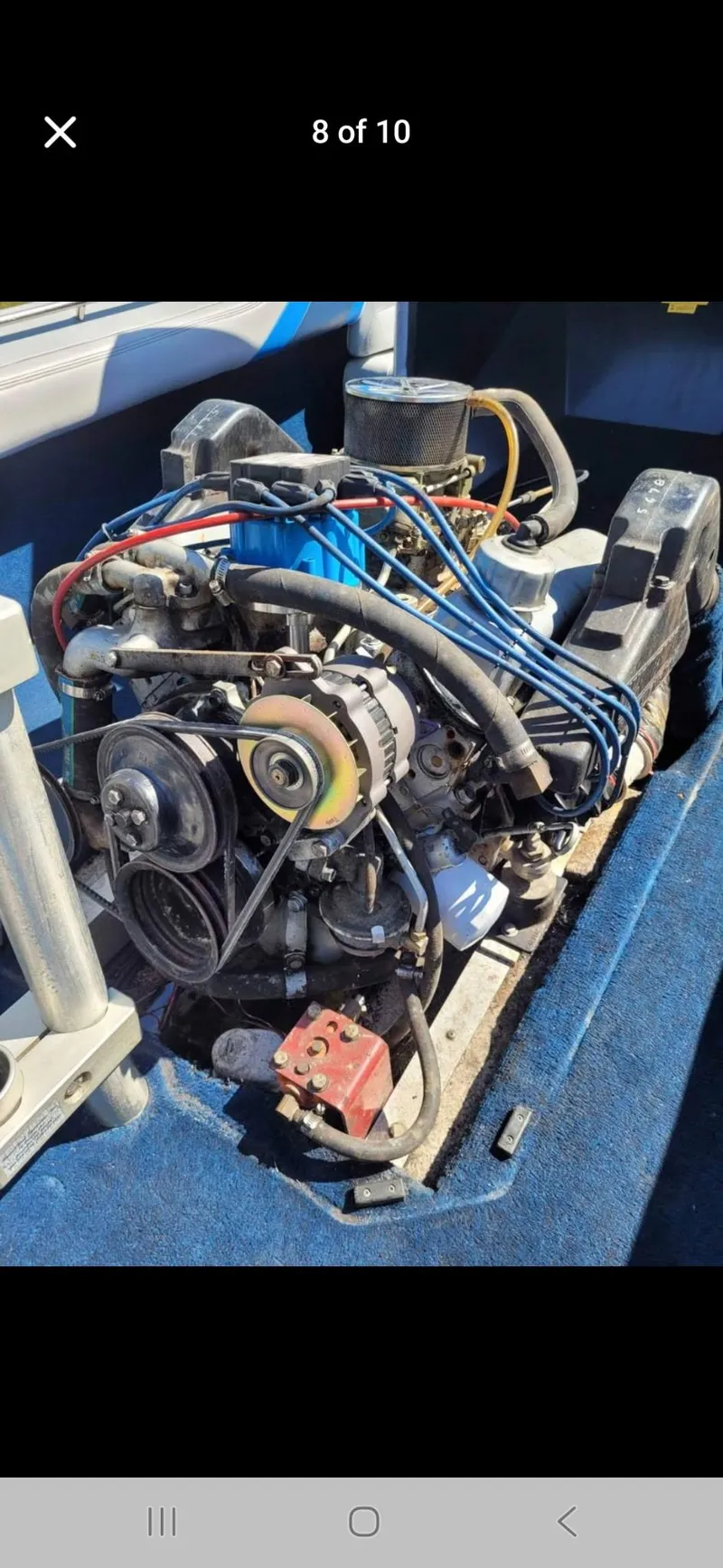 Slide: The Image of 1986 Correct Craft Ski Nautique engine, detailed view, showcasing mechanical components and wiring. - 6
