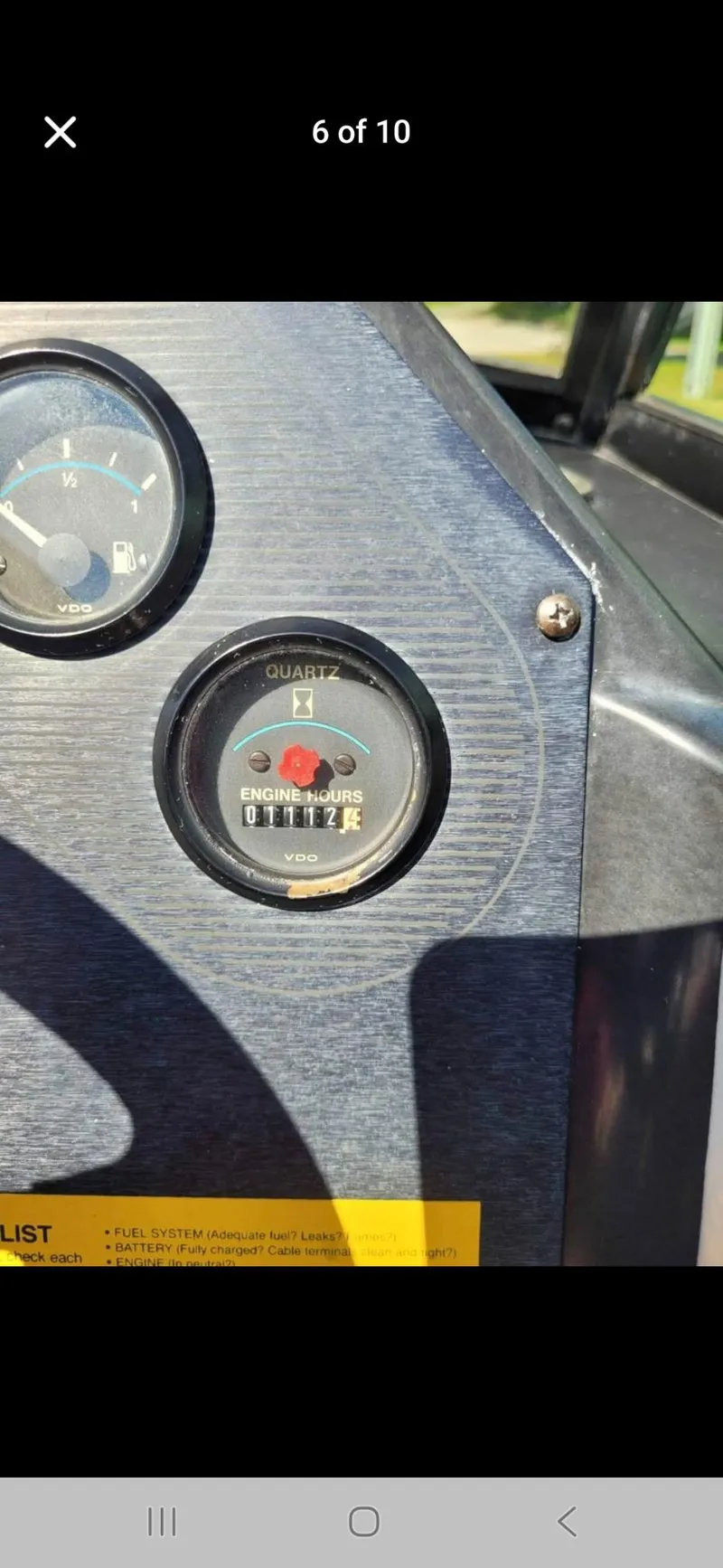 Slide: The Image of 1986 Correct Craft Ski Nautique dashboard with hour meter and gauge. - 9