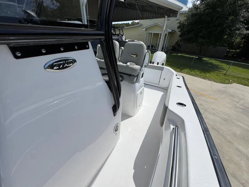 Slide: The Image of 2025 Cape Horn 27 XS boat interior, showcasing sleek design and comfortable seating. - 23