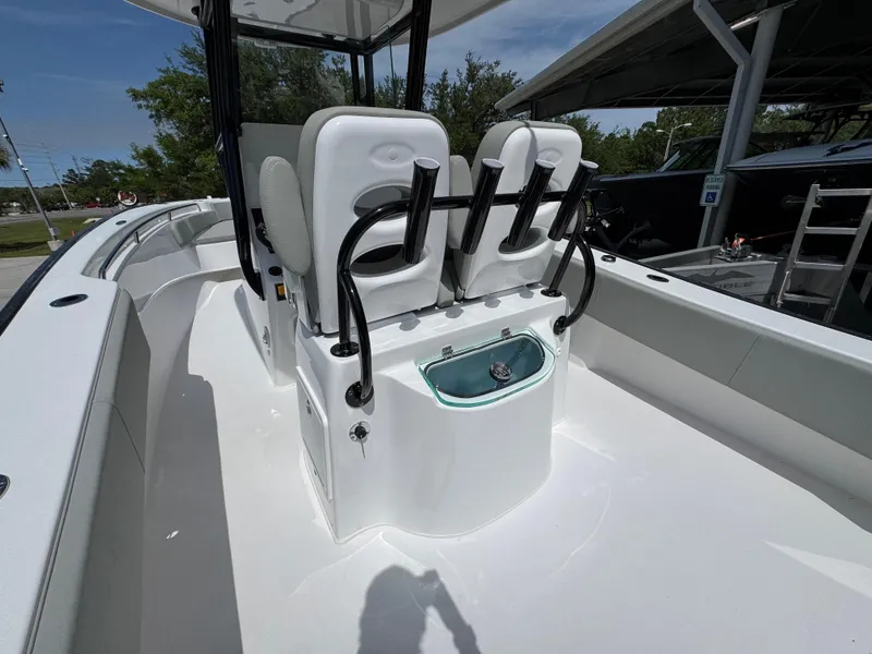 Slide: The Image of 2025 Cape Horn 27 XS boat interior with seating and console, showcasing sleek design. - 33
