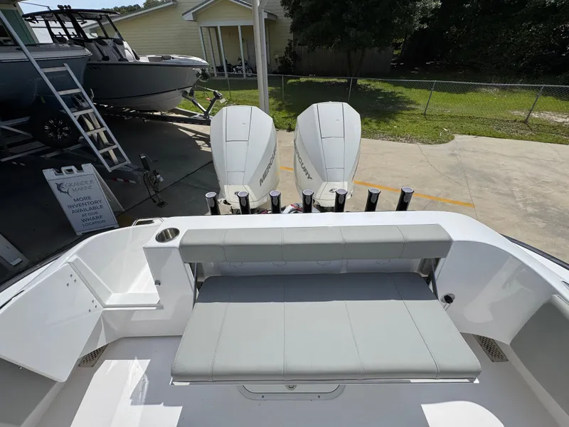 Slide: The Image of 2025 Cape Horn 27 XS boat with dual engines and seating area. - 36