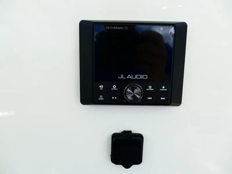 Slide: The Image of JL Audio MediaMaster 55 control panel on 2026 Pioneer 222 Islander boat. - 24