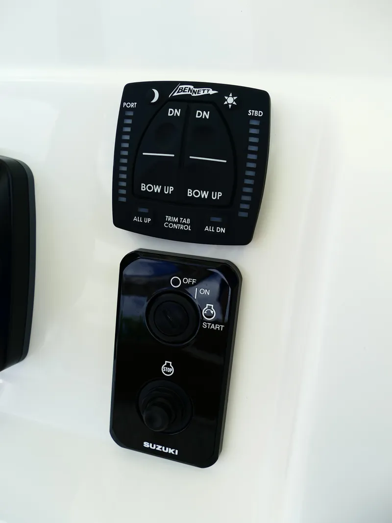 Slide: The Image of Control panel of 2026 Pioneer 222 Islander boat with Suzuki and Bennett systems. - 30