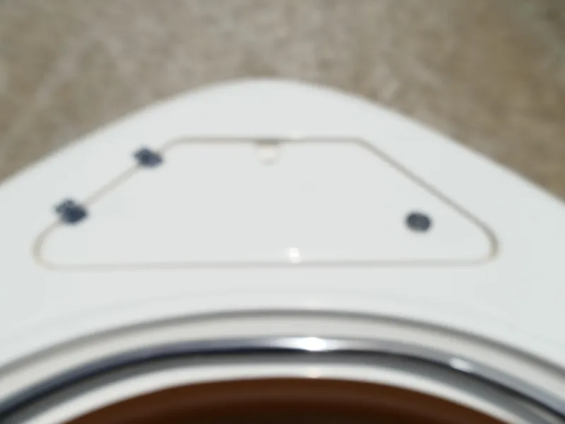 Slide: The Image of Blurry view of a 2026 Pioneer 222 Islander boat deck. - 42