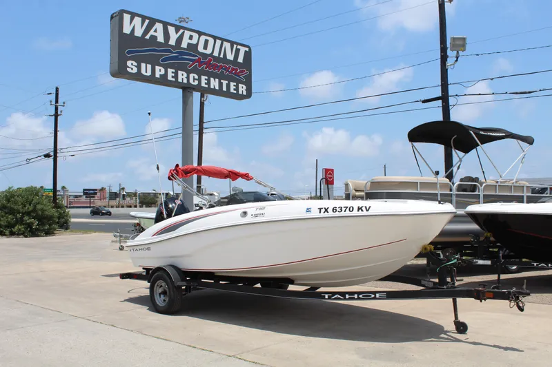 Slide: The Image of 2023 Tahoe T18 boat on trailer at Waypoint Marine Supercenter. - 1