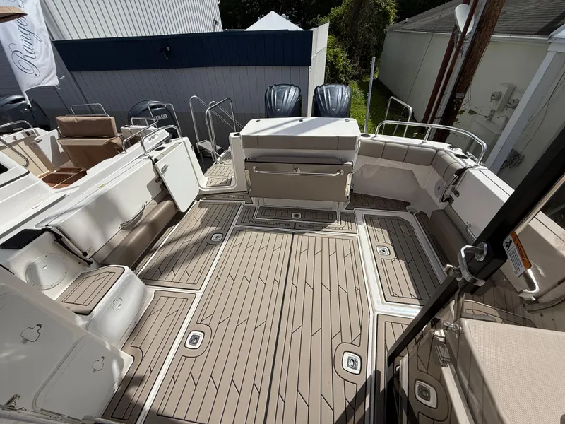 Slide: The Image of 2023 Cutwater C-32 CB boat deck with spacious seating and modern design. - 13