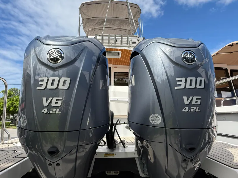 Slide: The Image of 2023 Cutwater C-32 CB with dual Yamaha 300 V6 4.2L outboard engines. - 4