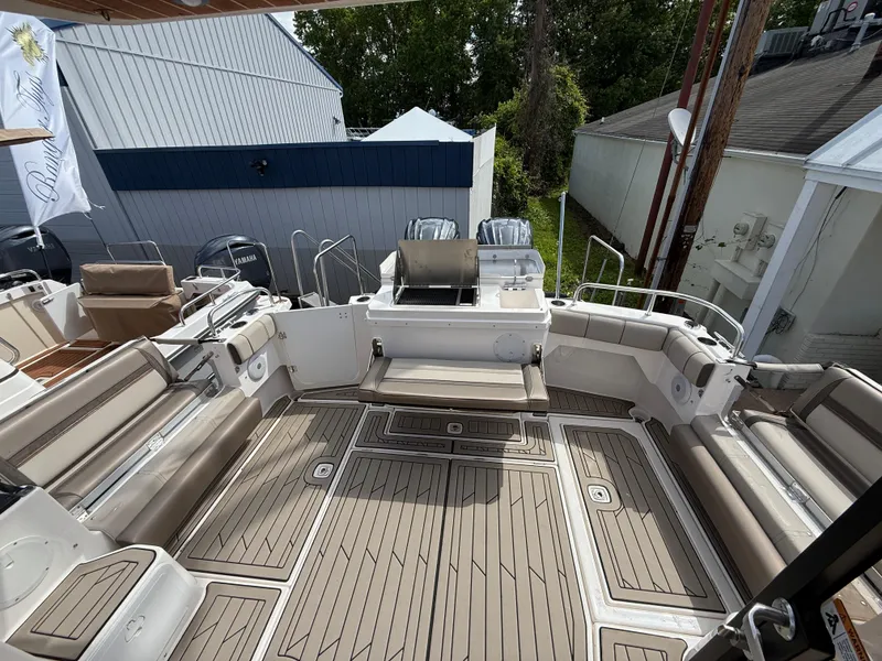 Slide: The Image of 2023 Cutwater C-32 CB boat interior with spacious seating and modern design. - 8