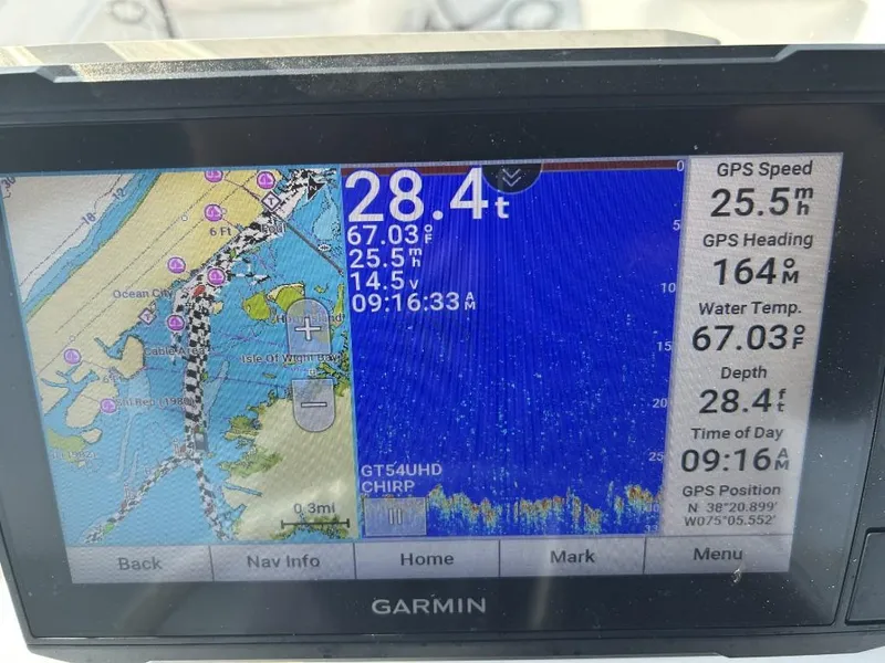 Slide: The Image of Garmin GPS display on 2024 C-Hawk 19 Center Console showing navigation and depth data. - 11