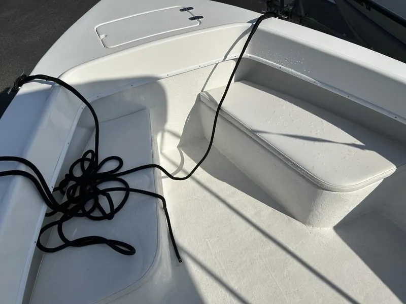 Slide: The Image of 2024 C-Hawk 19 Center Console boat interior with seating and rope. - 13