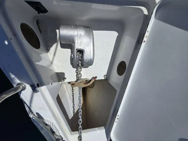 Slide: The Image of Anchor locker of 2002 Beneteau First 36.7 sailboat with chain and rope. - 12