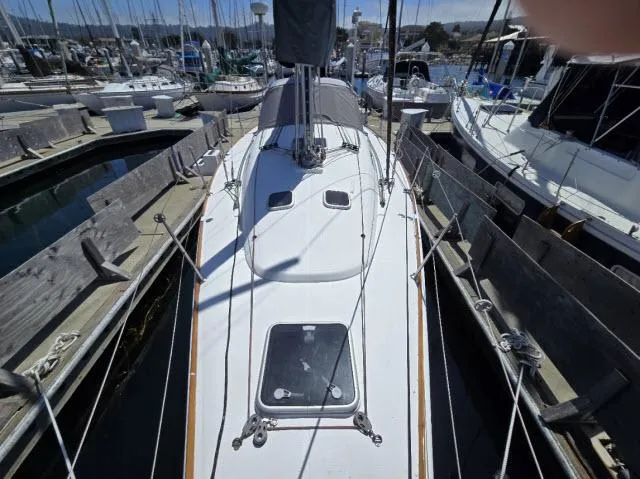 Slide: The Image of Beneteau First 36.7 sailboat docked, 2002 model, viewed from above. - 13