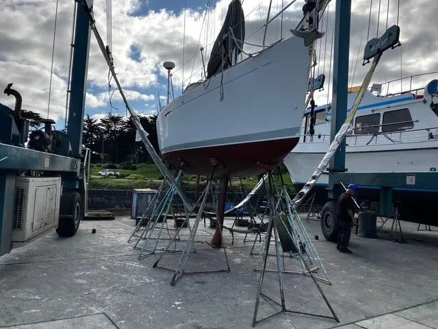 Slide: The Image of Beneteau First 36.7 sailboat from 2002 on dry dock for maintenance. - 15
