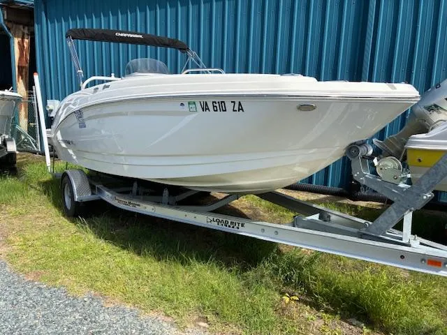 Slide: The Image of 2018 Chaparral 191 Suncoast boat on trailer, parked outdoors. - 0