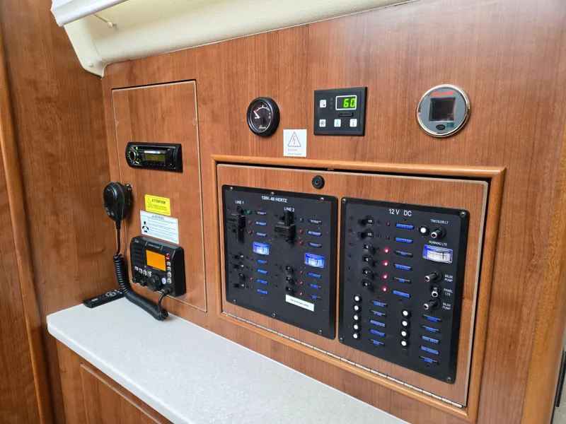 Slide: The Image of 2013 Gemini Legacy 35 Navigation and DC / AC panel - 11