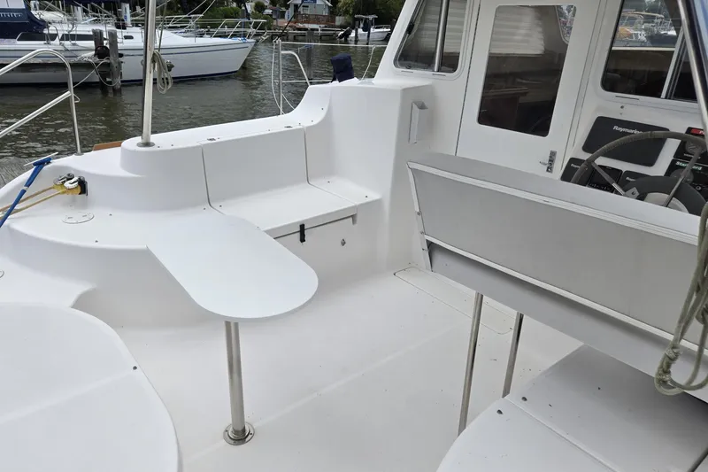 Slide: The Image of Cockpit of 2013 Gemini Legacy 35 sailboat with seating and steering wheel. - 5