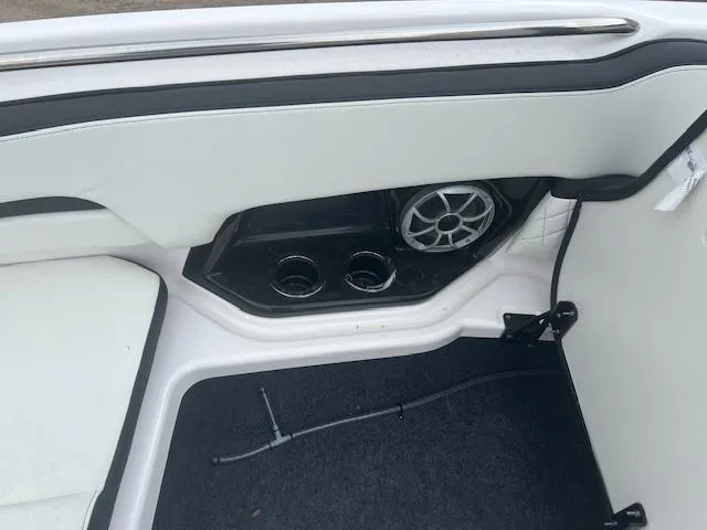 Slide: The Image of 2024 Yamaha Boats 252 S interior with speaker and cup holders. - 10