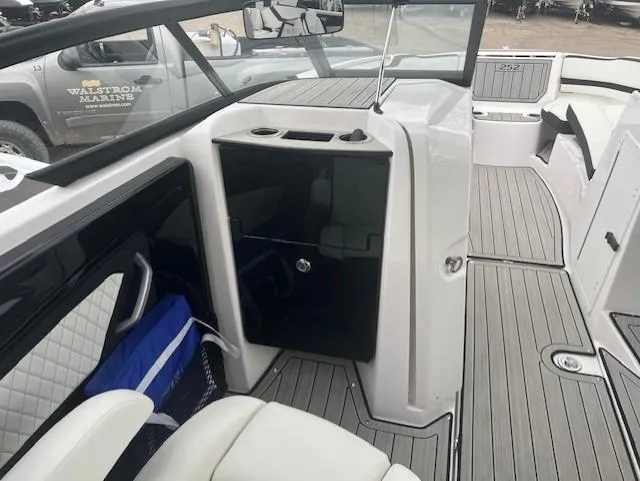 Slide: The Image of 2024 Yamaha Boats 252 S interior with sleek seating and modern design. - 18
