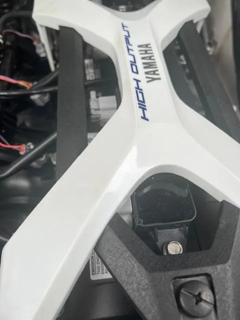 Slide: The Image of 2024 Yamaha Boats 252 S high output engine detail with white cover. - 22