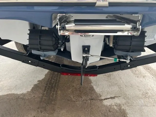 Slide: The Image of 2024 Yamaha Boats 252 S rear view showcasing dual engines and trailer setup. - 28